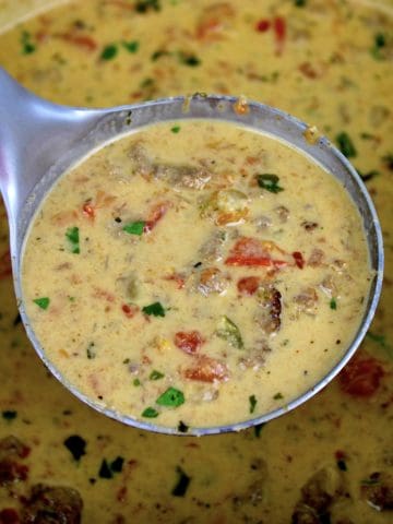 ladle of taco soup over pot