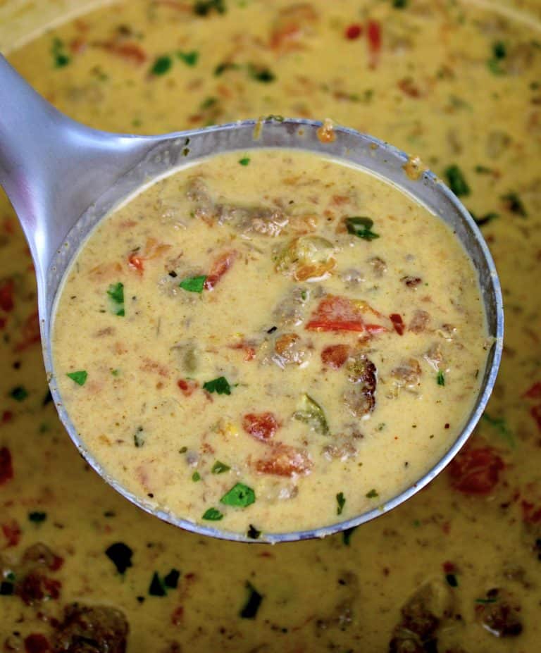ladle of taco soup over pot