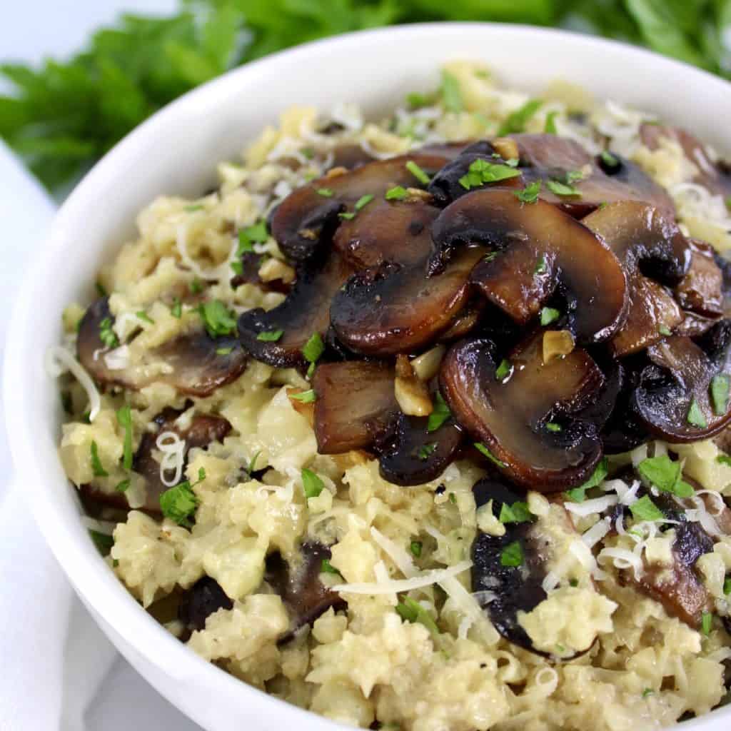 cauliflower mushroom risotto in white bowl