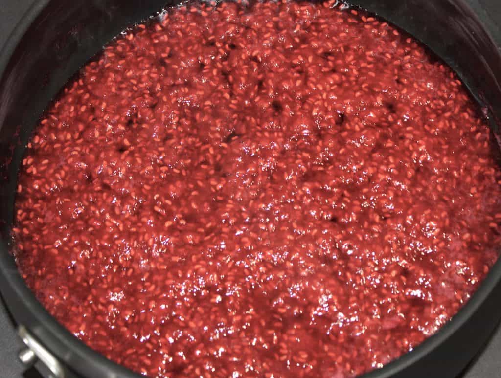 cooked raspberry jam in saucepan