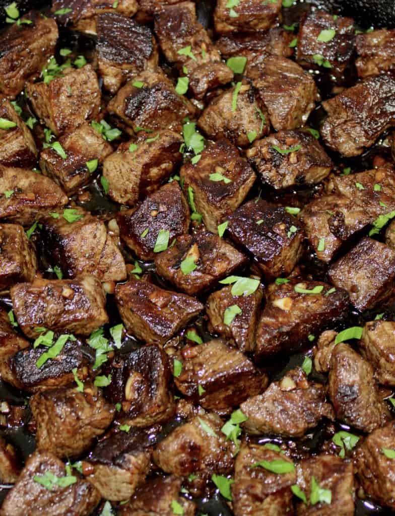 steak bites with parsley on top