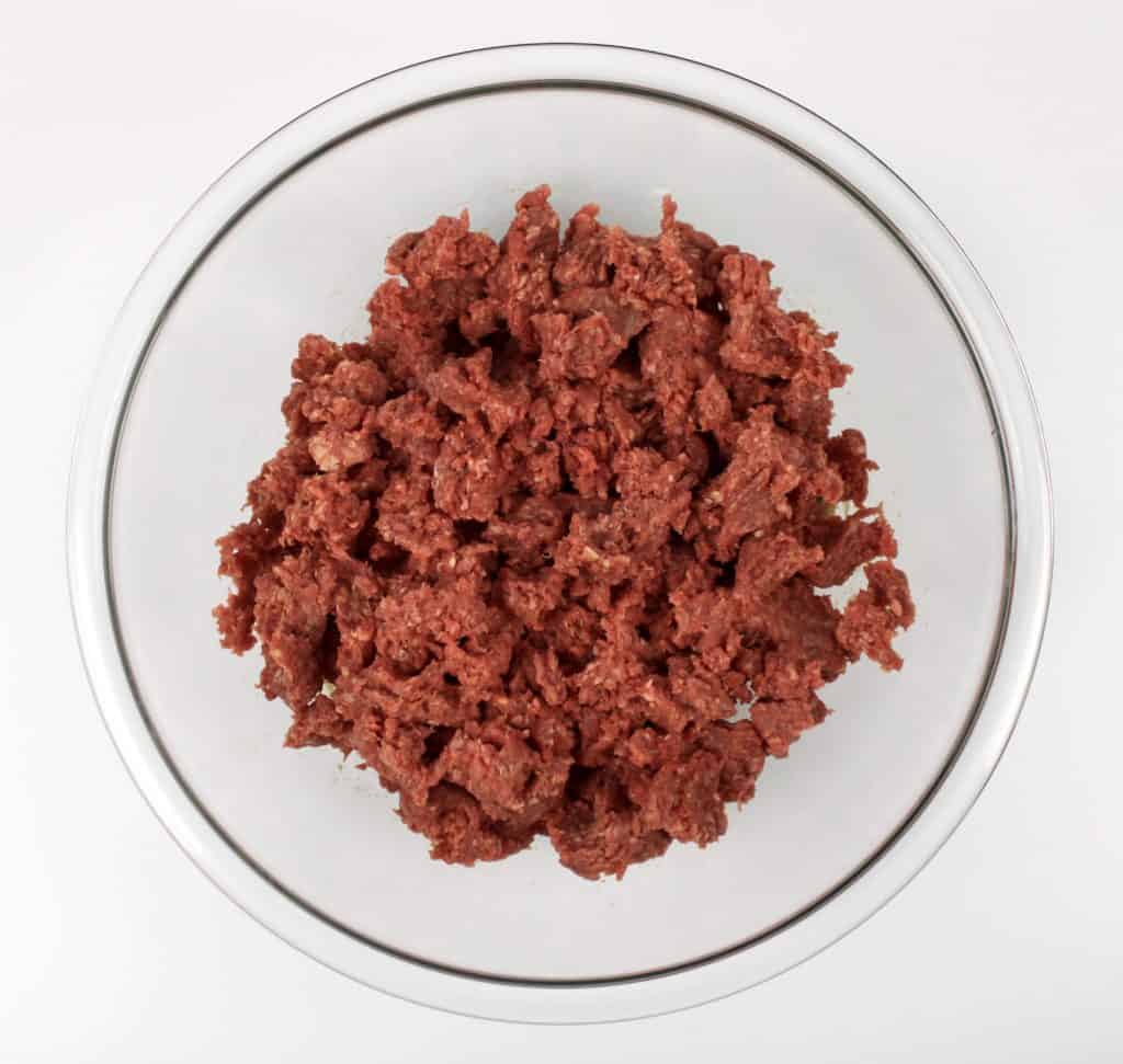 raw ground beef in glass bowl