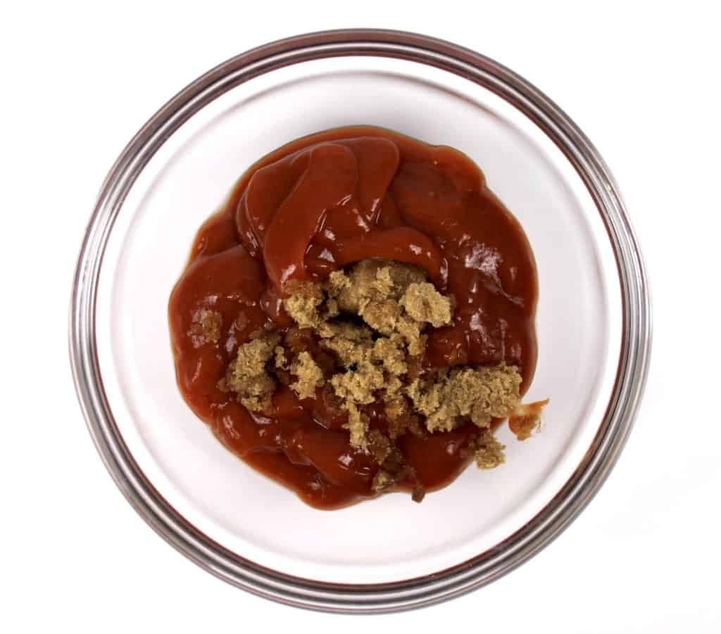 ketchup and brown sugar in glass bowl