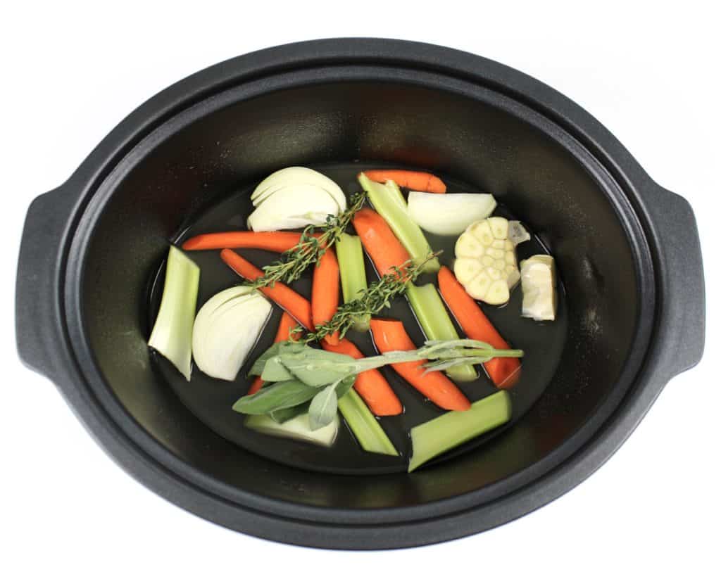 cut veggies in slow cooker insert
