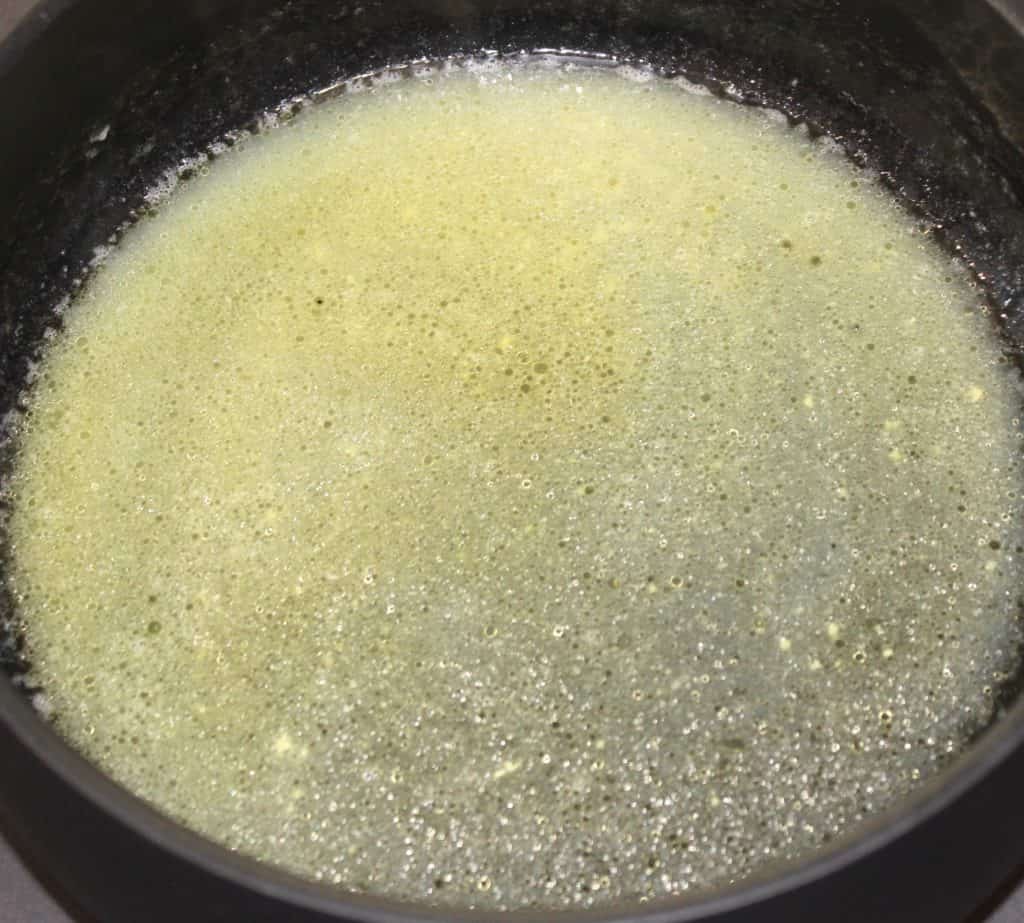 chicken stock and butter in saucepan