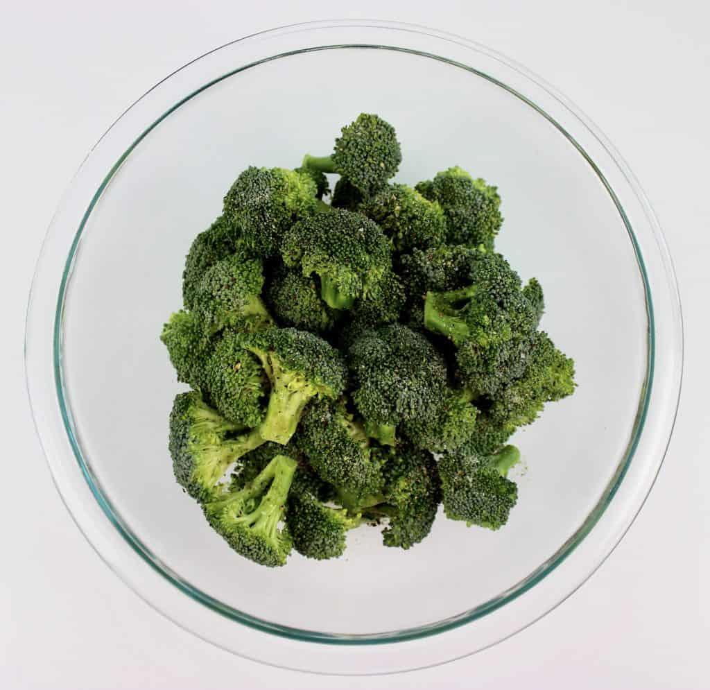 broccoli florets in glass bowl