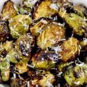 closeup of Air Fryer Brussels Sprouts with grated cheese on top
