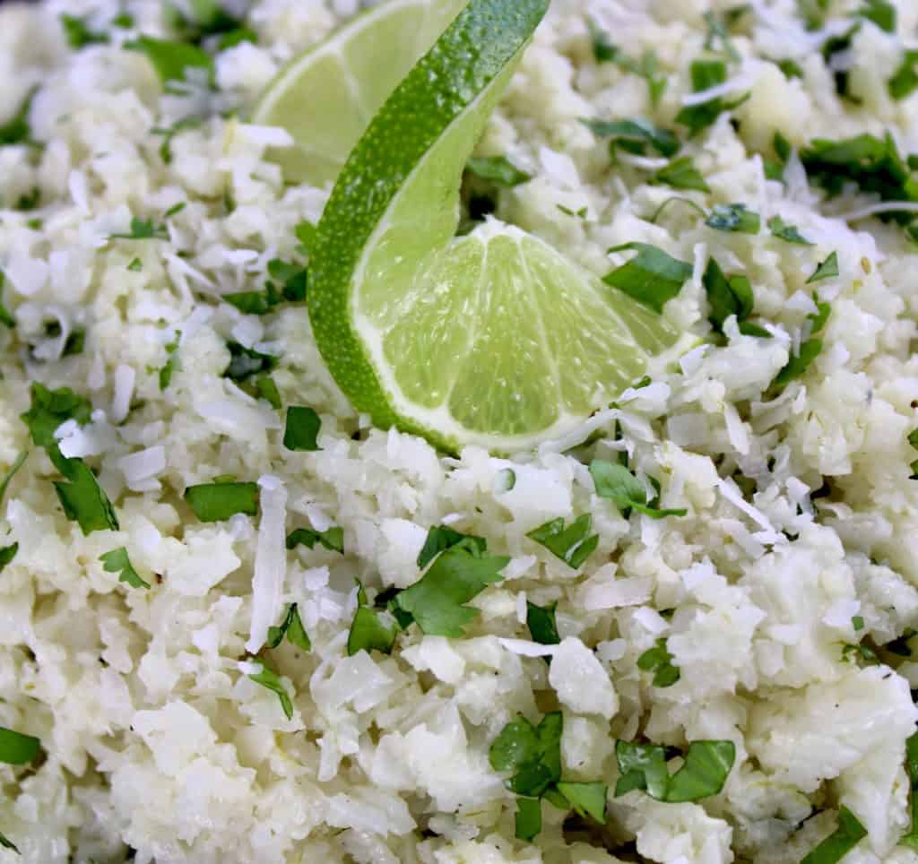 closeup of Coconut Cauliflower Rice with lime twist on top