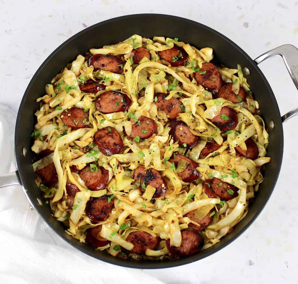 overhead view of Fried Cabbage and Sausage in skillet