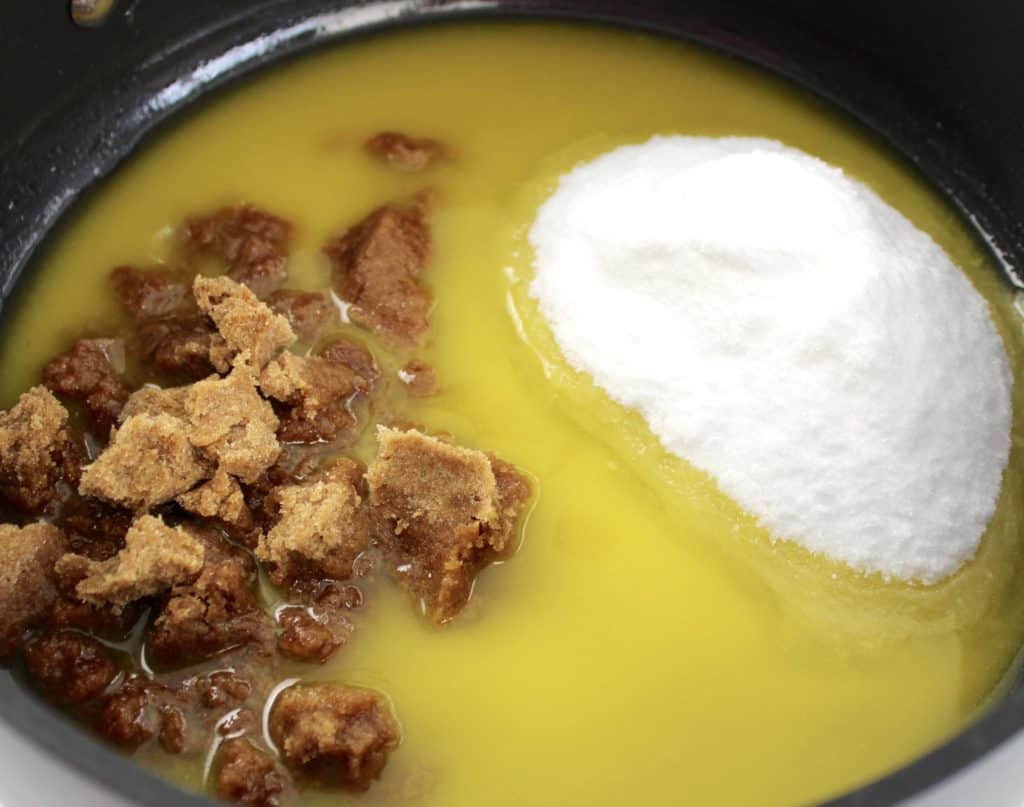 melted butter with sugar and brown sugar in saucepan