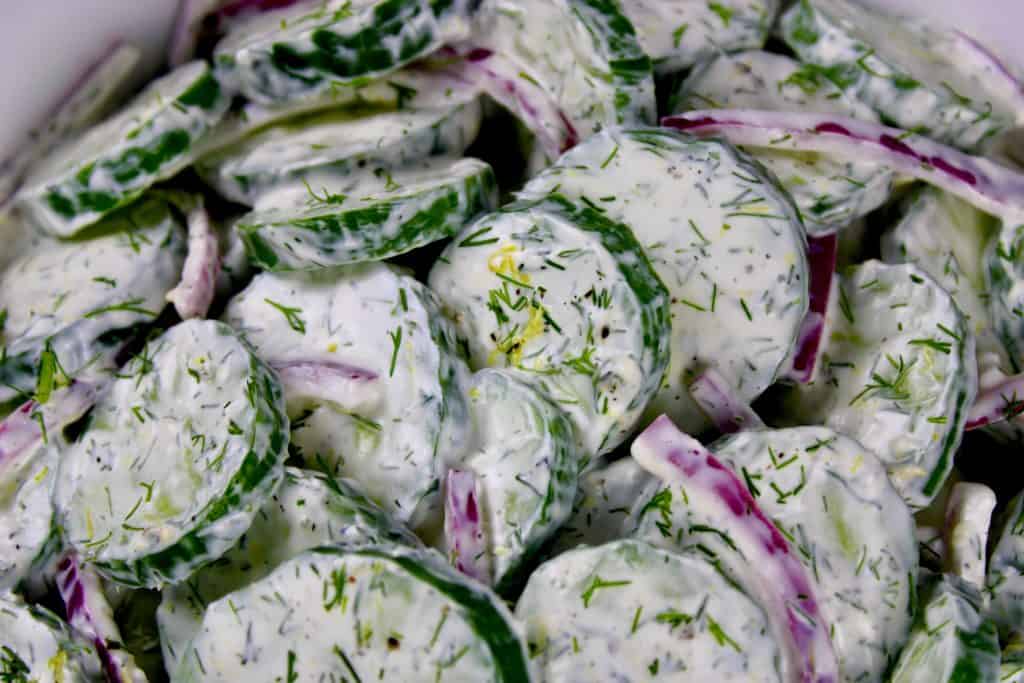 closeup of Creamy Cucumber Salad with dill