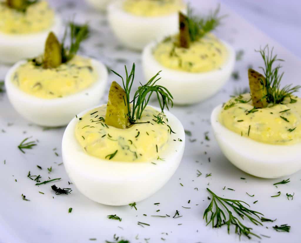 closeup of Dill Pickle Deviled Eggs on white plate