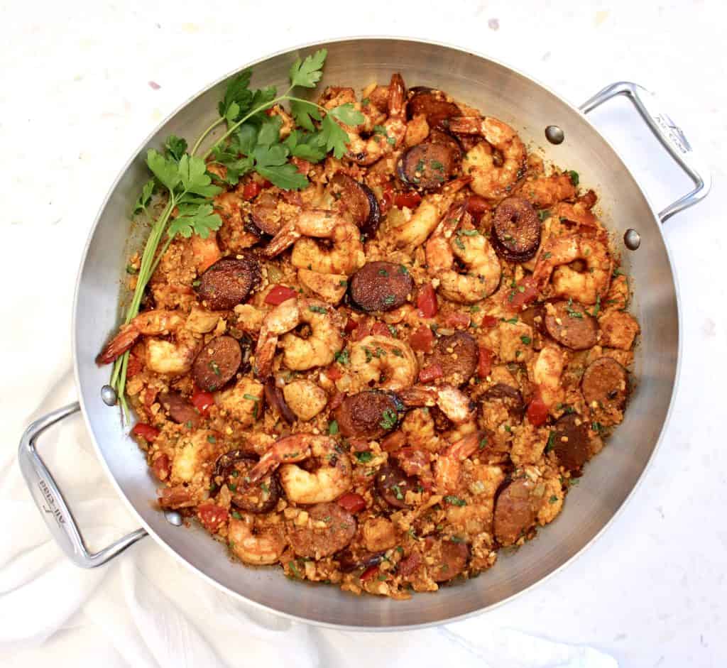 overhead view of Keto Jambalaya in skillet with parsley on side