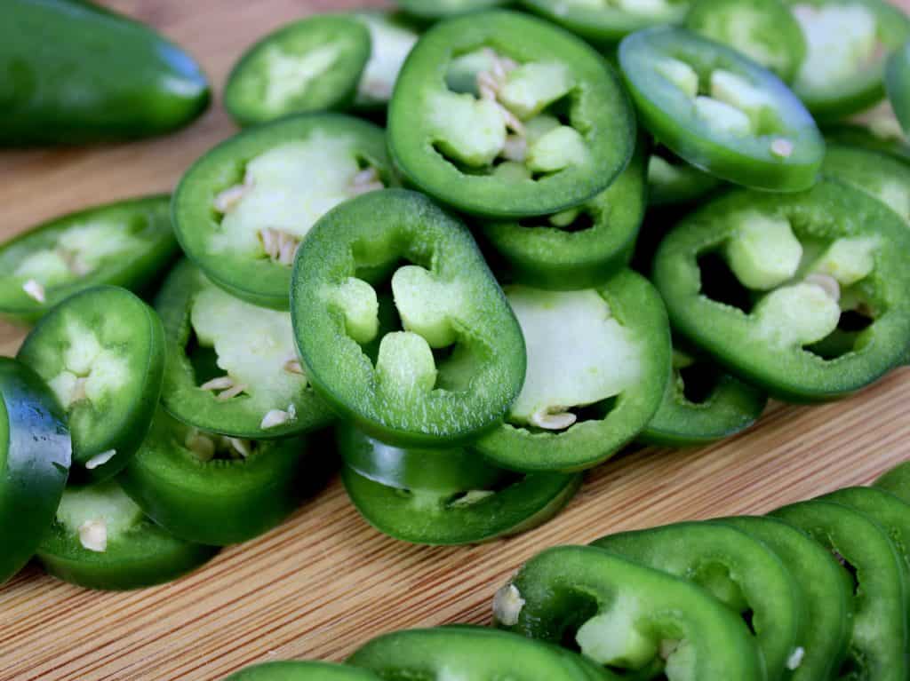 jalapeno pepper slices on cutting board