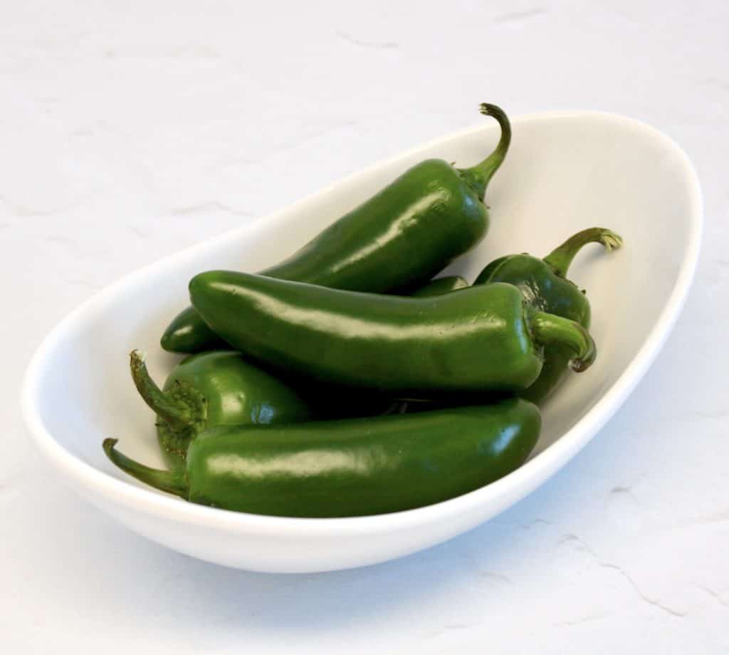 white bowl of jalapeno peppers