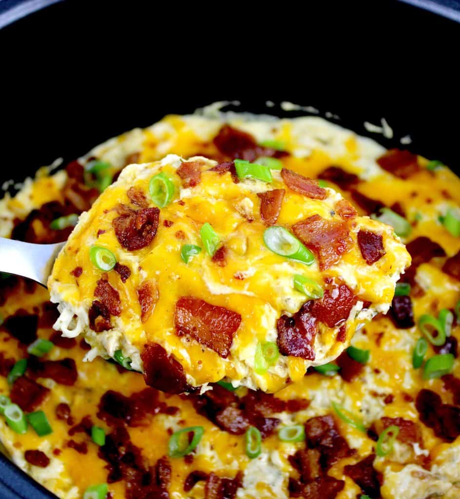 spoonful of ranch chicken with cheese and bacon on top