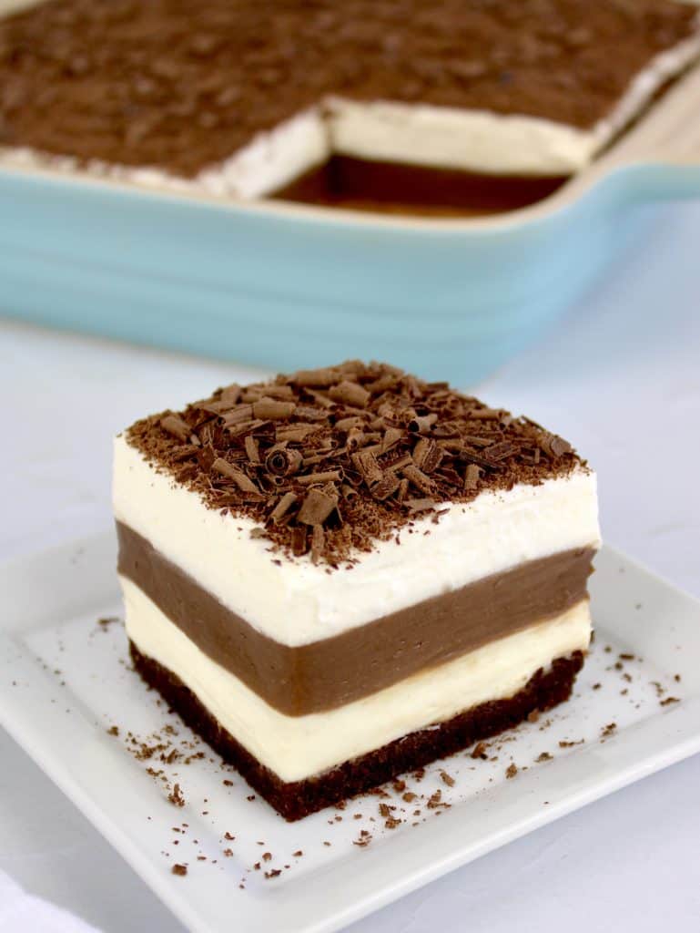 closeup of slice of chocolate lasagna with casserole in background