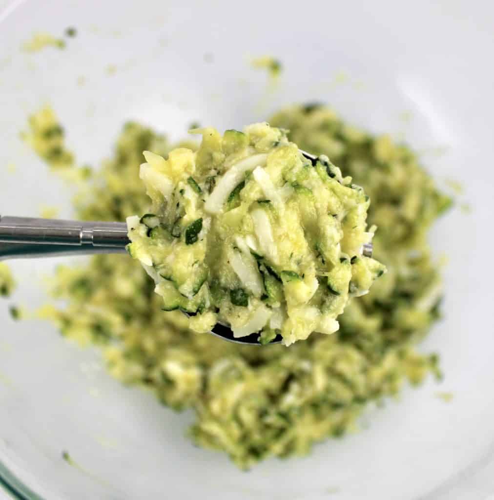 Keto Zucchini Fritters batter in cookie scoop
