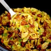 Slow Cooker Cabbage with serving spoon full