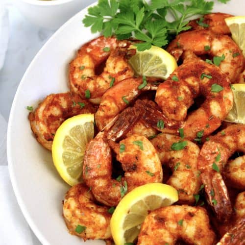 Air Fryer Blackened Shrimp with slices and parsley garnish