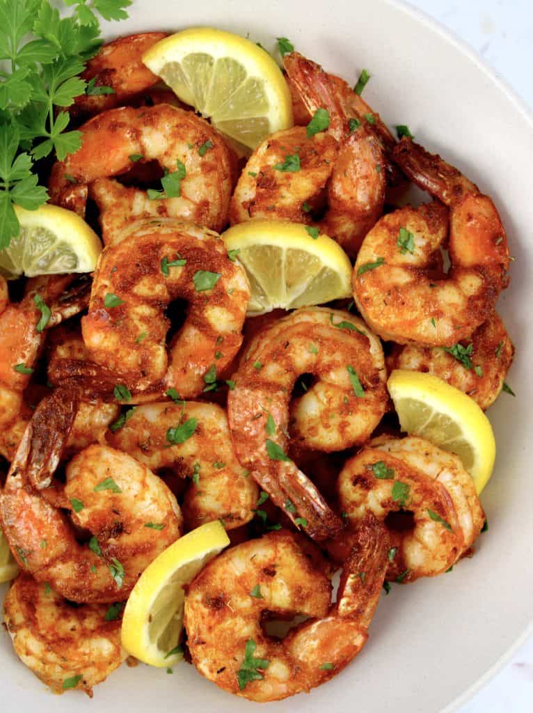 Air Fryer Blackened Shrimp with slices and parsley garnish