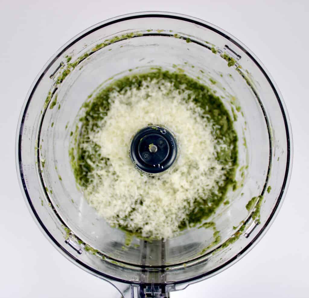 pesto sauce with grated parmesan cheese in food processor