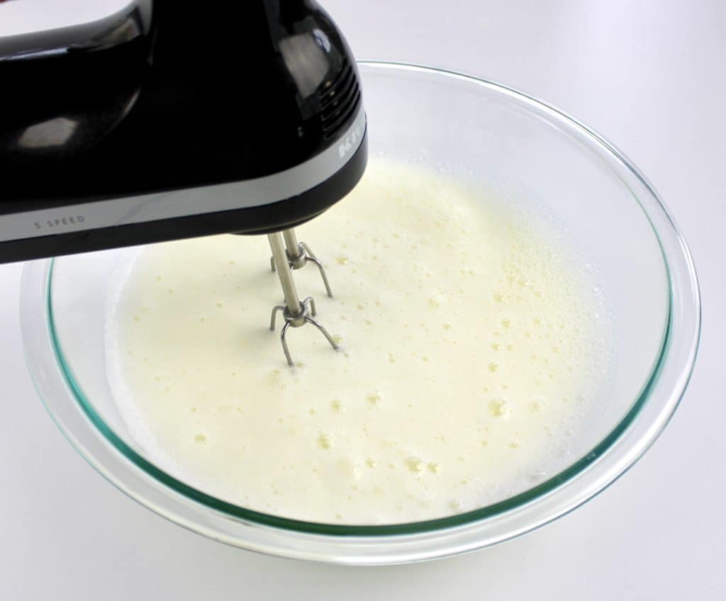 egg whites being whipped until foamy