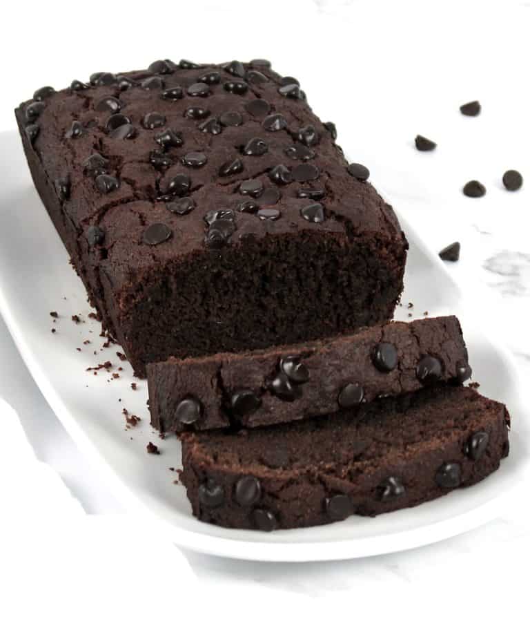 Keto Chocolate Zucchini Bread sliced on white plate
