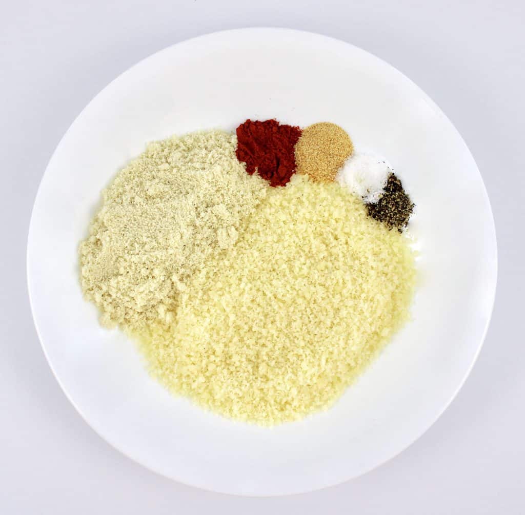 grated parmesan cheese almond flour and spices in white bowl