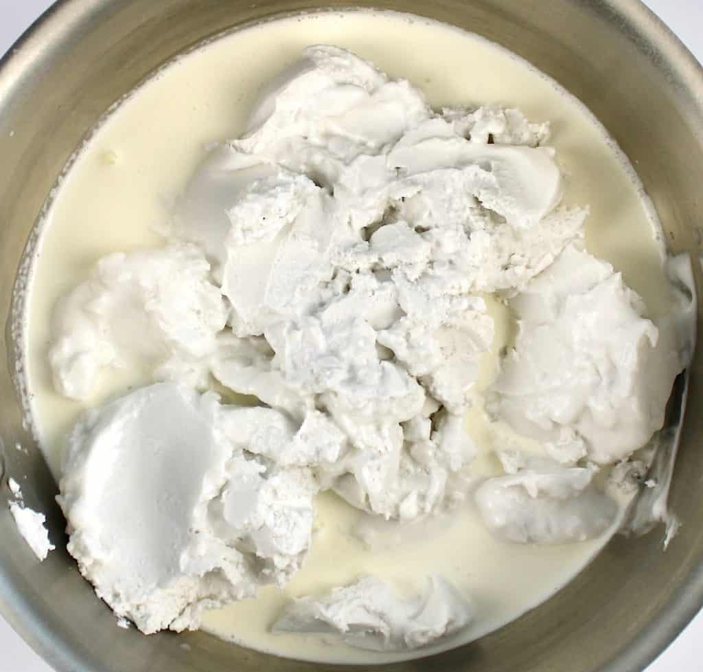 coconut cream and heavy cream in saucepan
