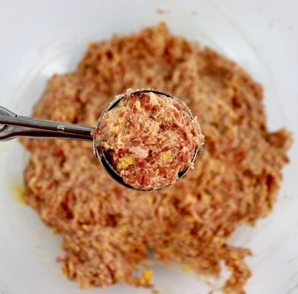 cookie scoop with sausage ball mixture