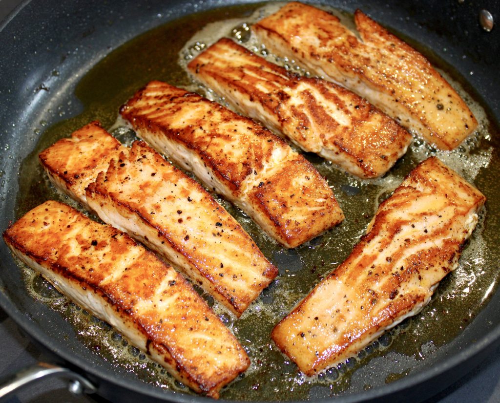 6 pieces seared salmon in skillet