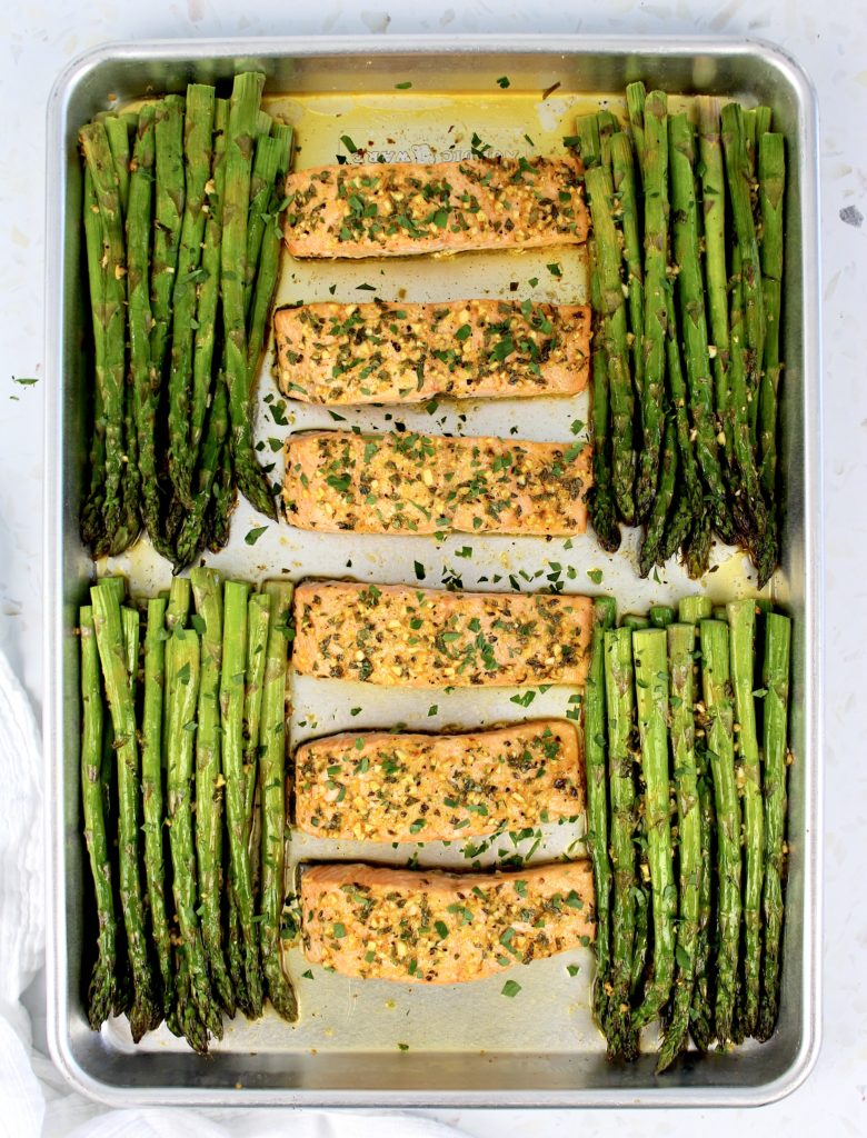 6 pieces of salmon and 4 bunches of asparagus on sheet pan