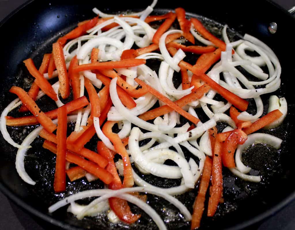 red pepper and onions in skillet