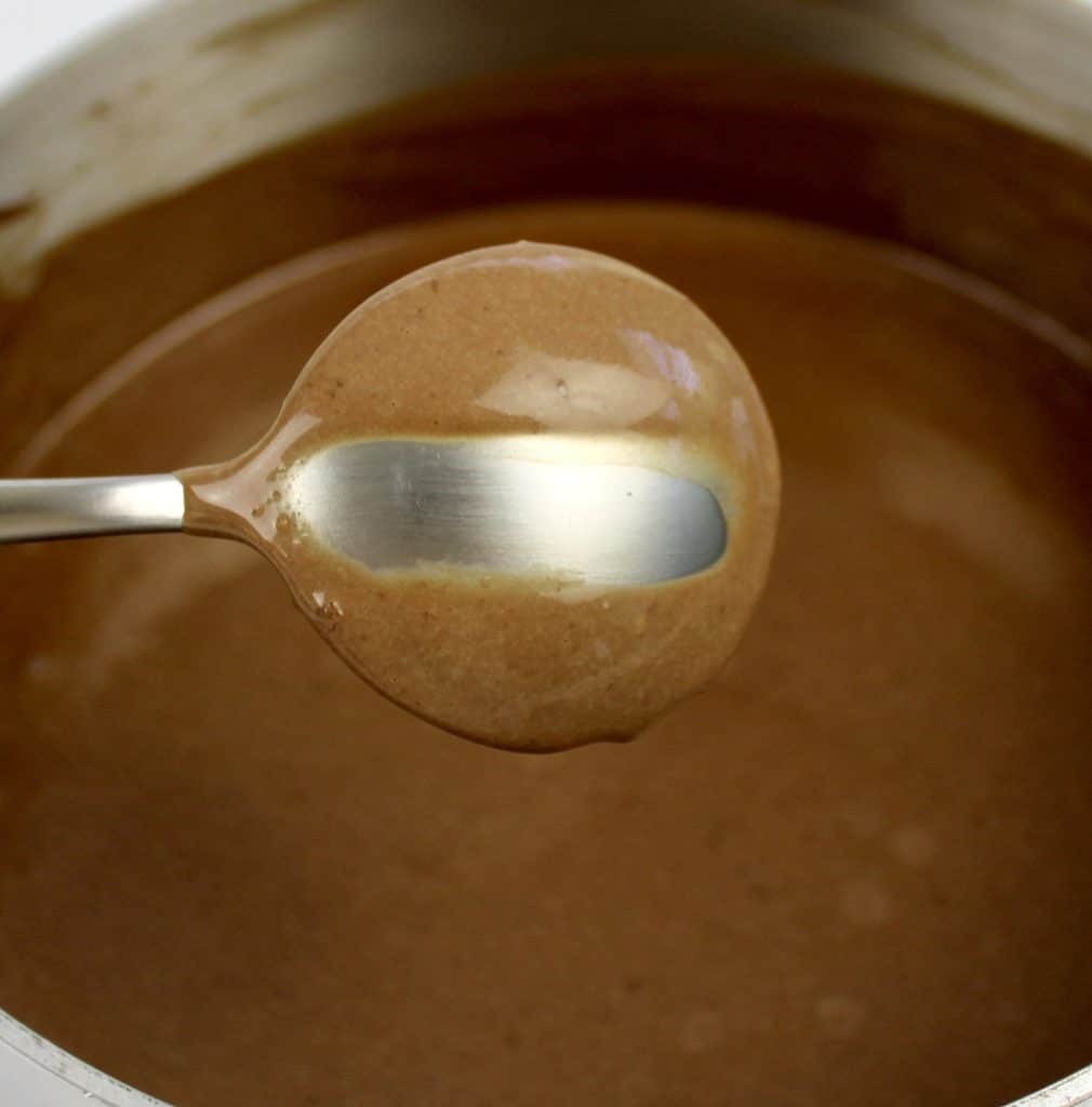 chocolate custard coating back of spoon with line through it