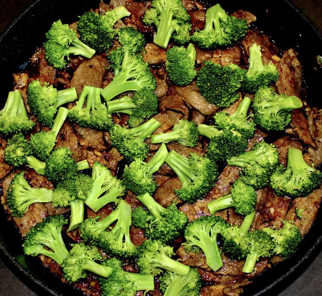 Beef and Broccoli being cooked in skillet