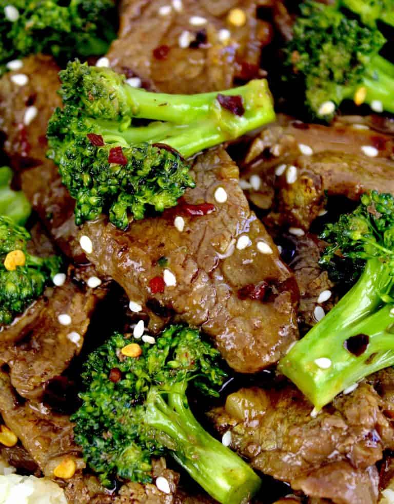 closeup of Beef and Broccoli with red pepper flakes on top