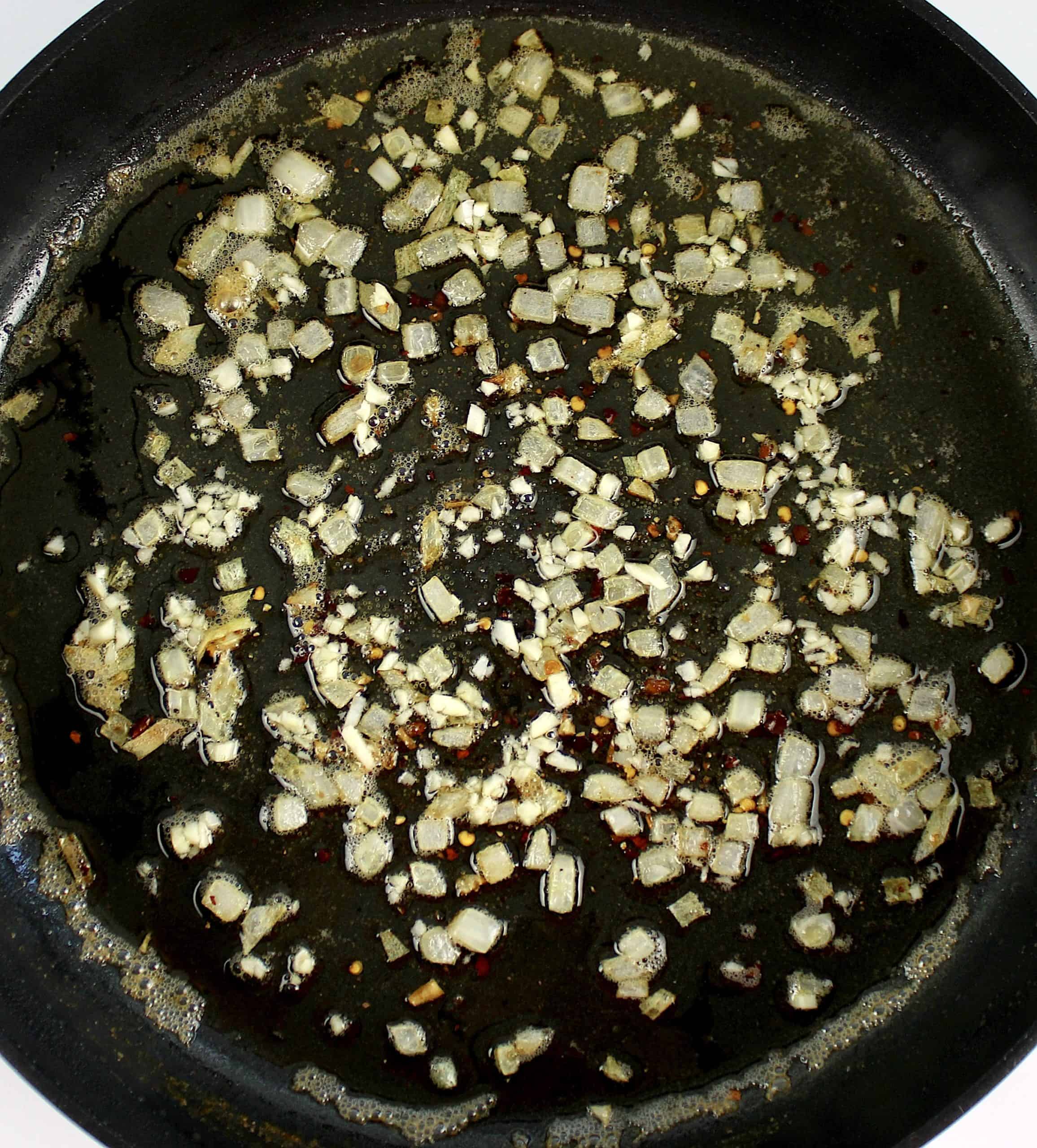 chopped onion and garlic in skillet