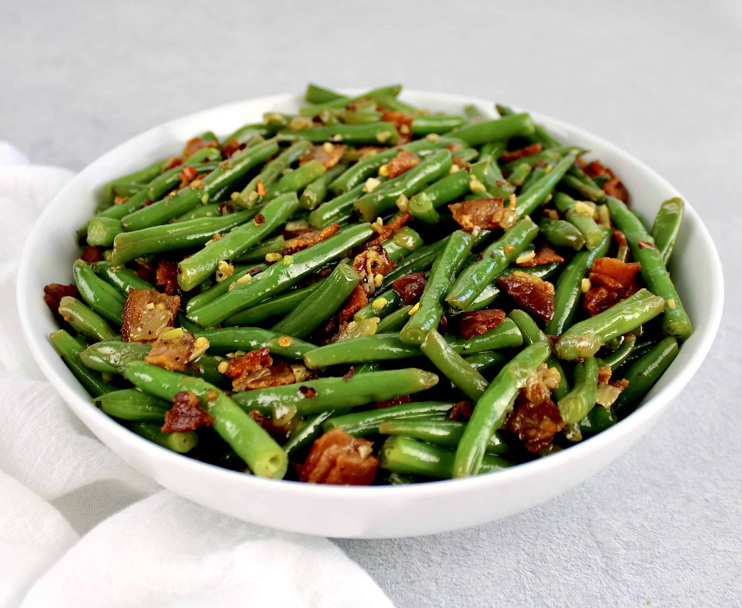 Green Beans with Bacon in white bowl
