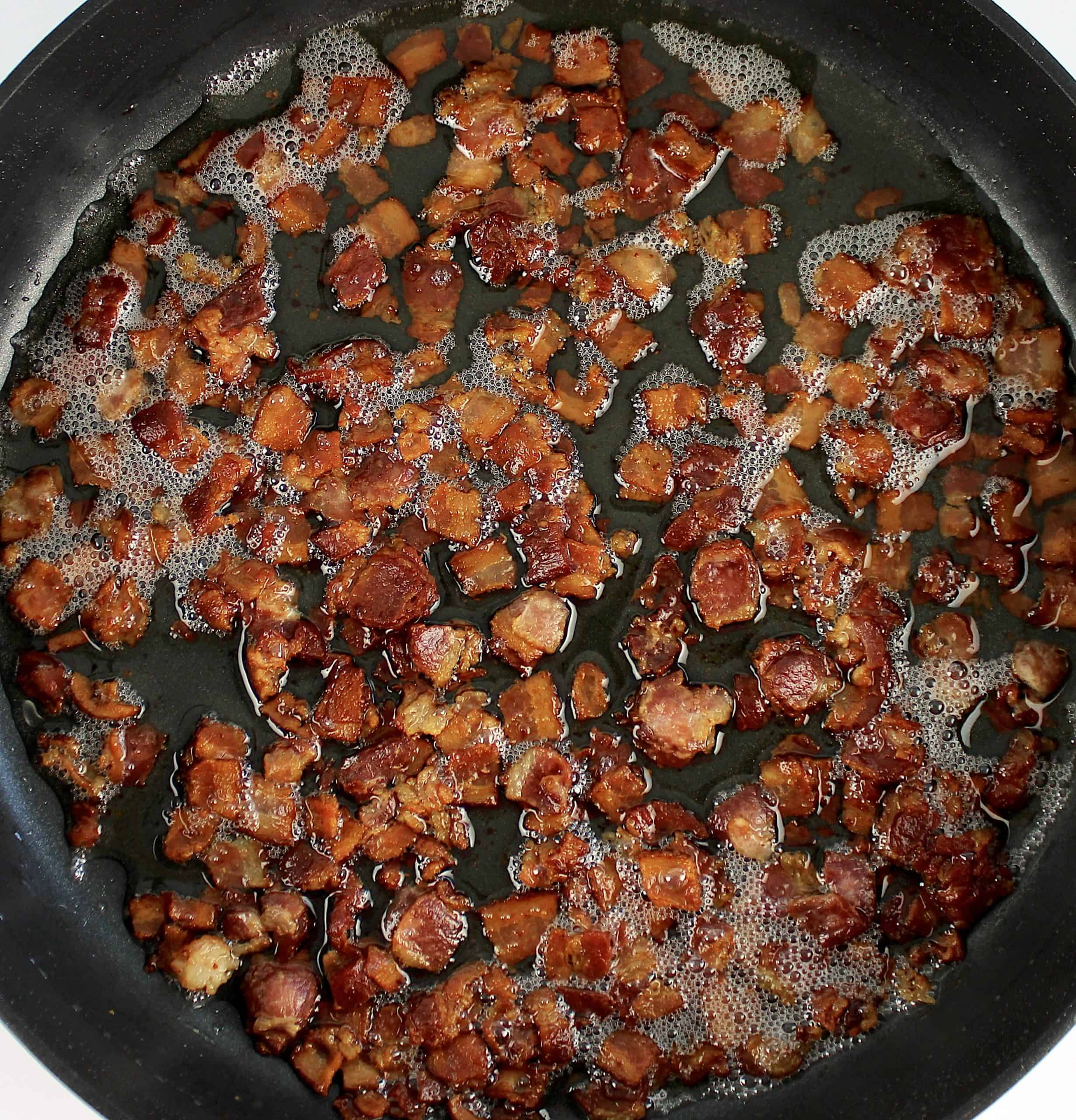 chopped bacon fried crispy in skillet