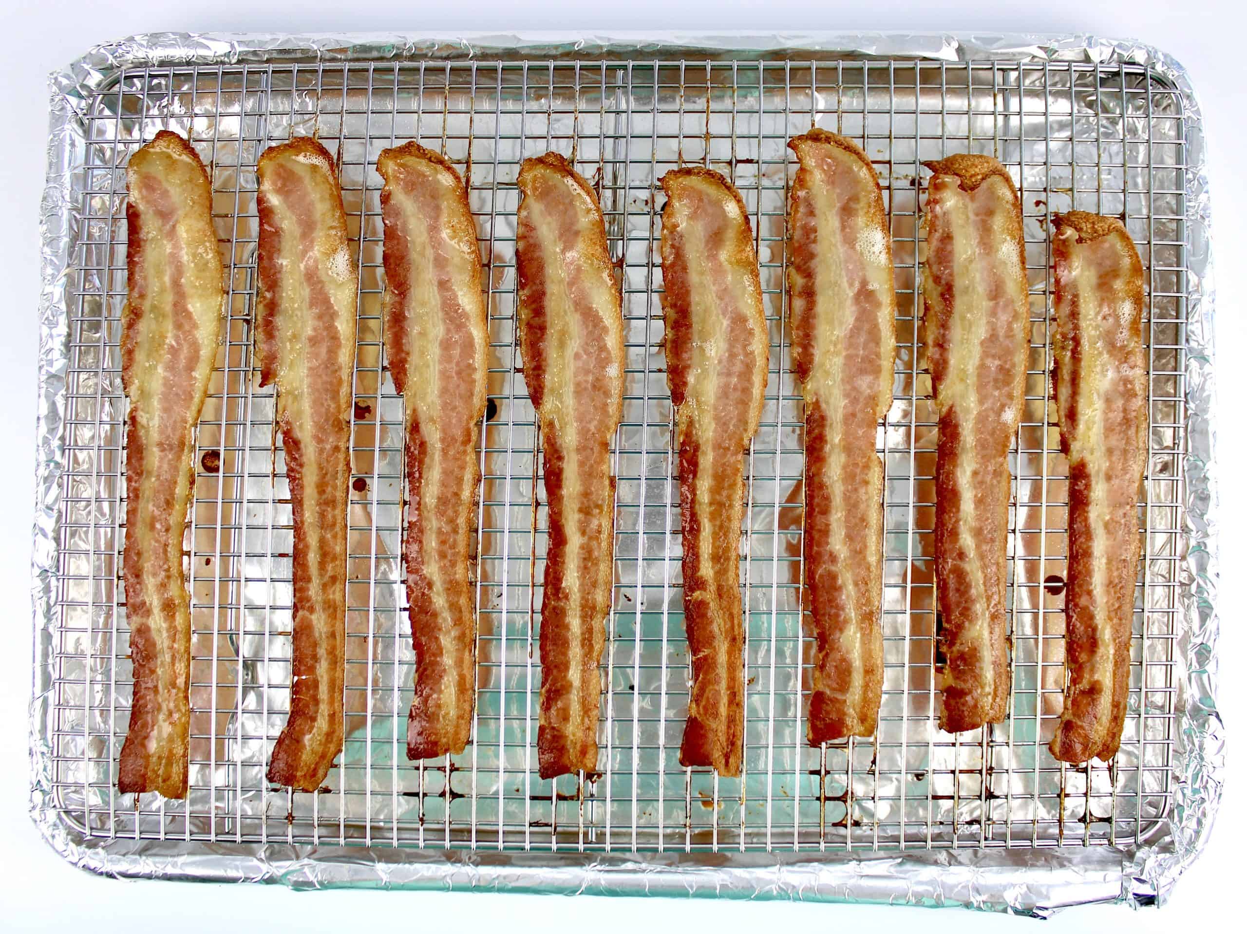 slices of cooked bacon on wire rack