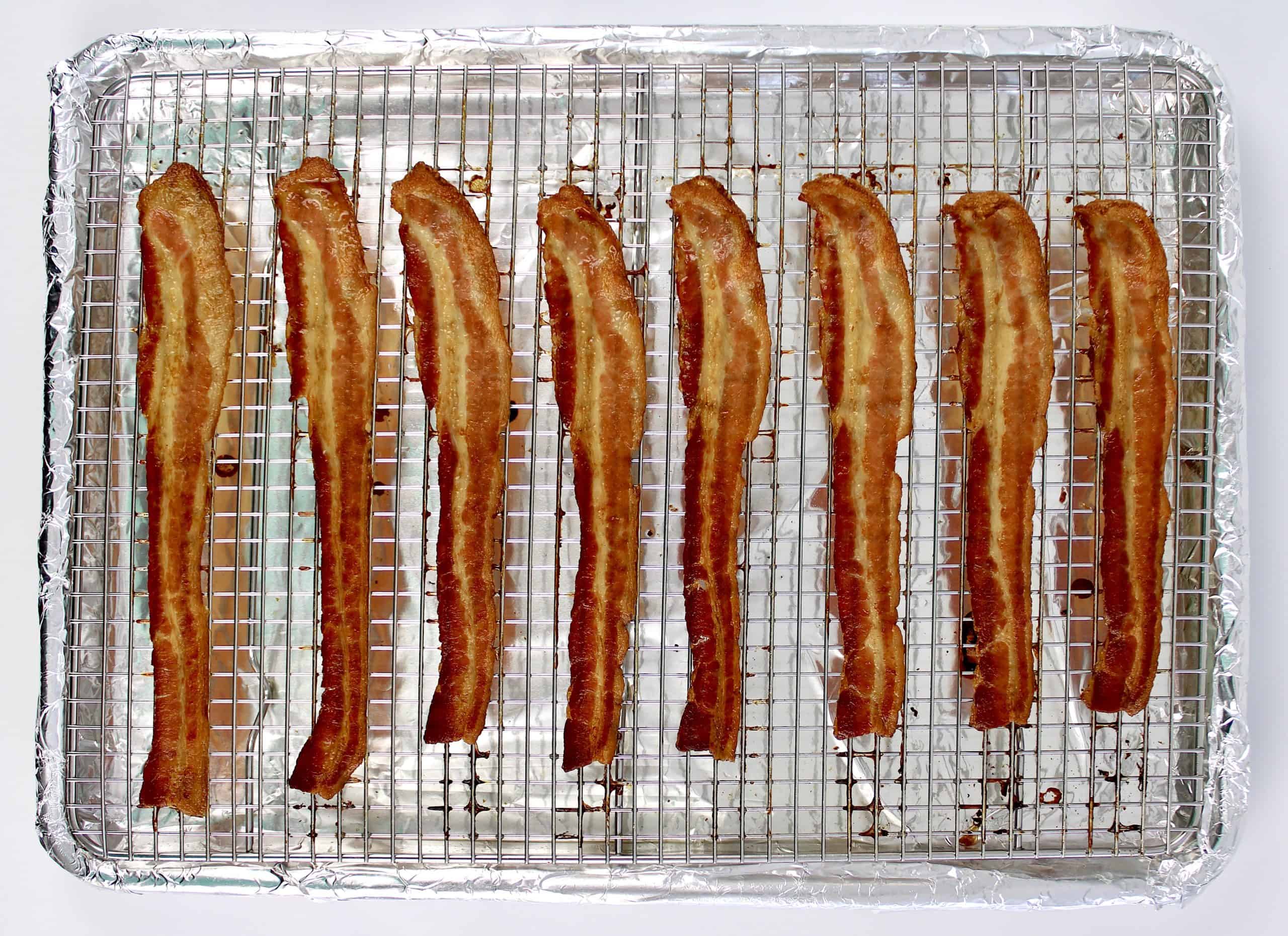slices of cooked bacon on wire rack