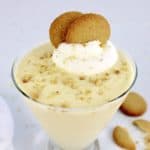 vanilla pudding in glass with nilla wafers and whip cream on top