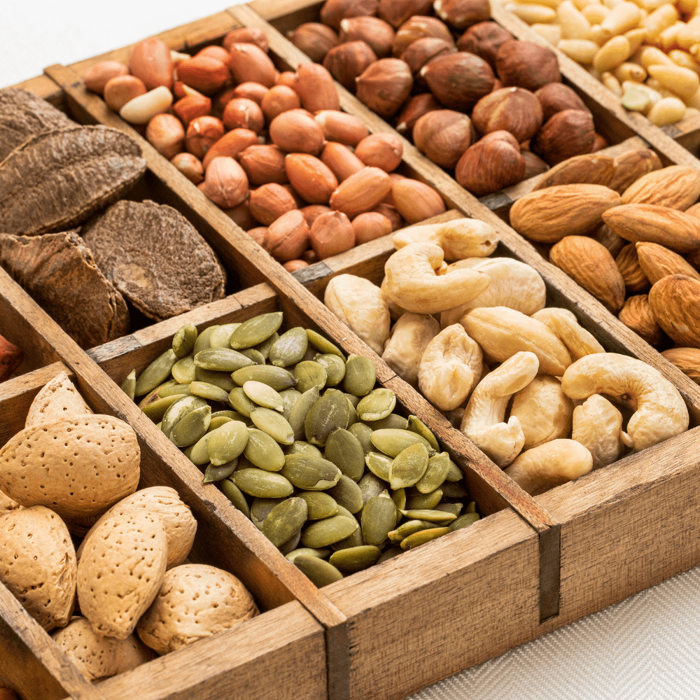 nuts and seeds in wooden boxes