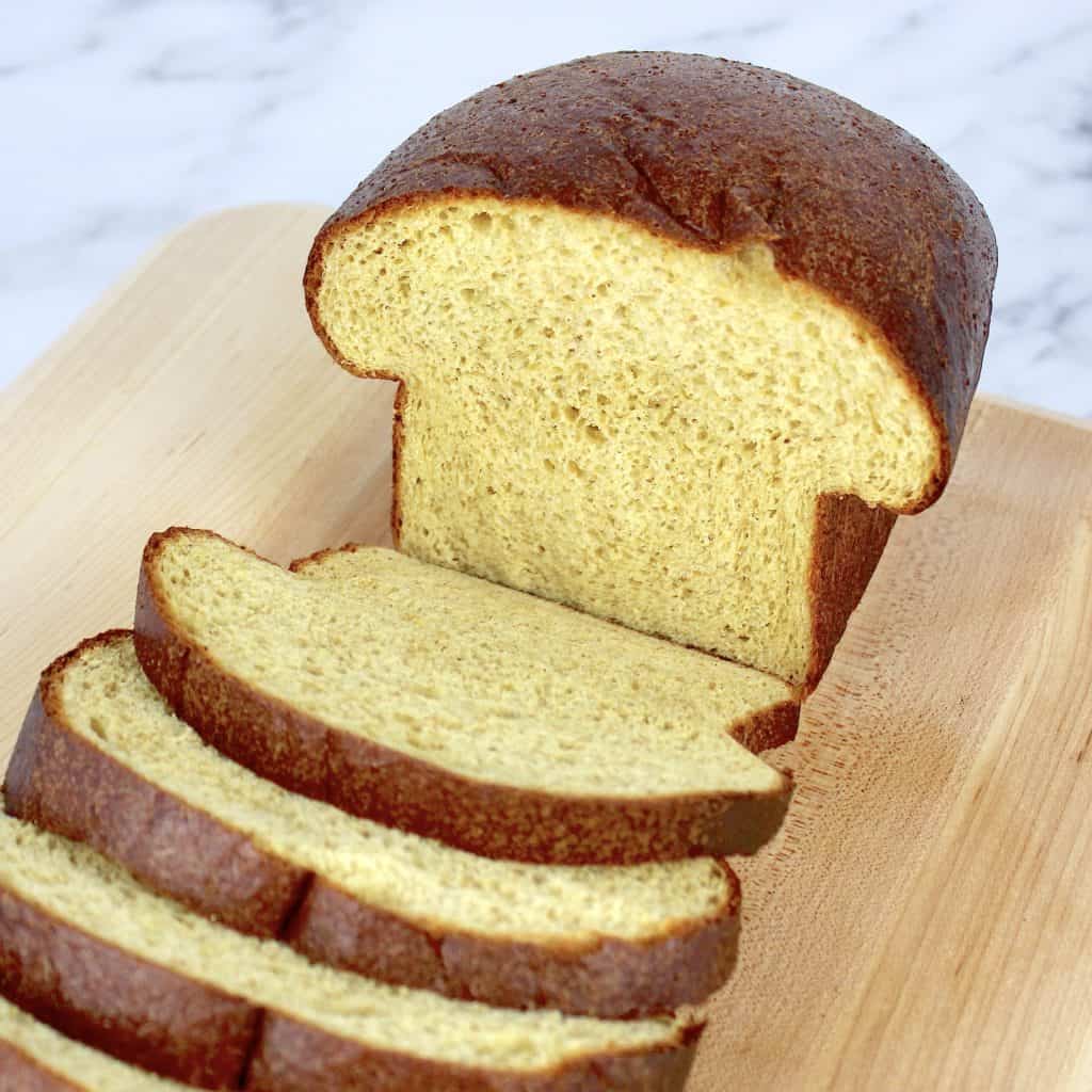 loaf of keto bread cut open and sliced