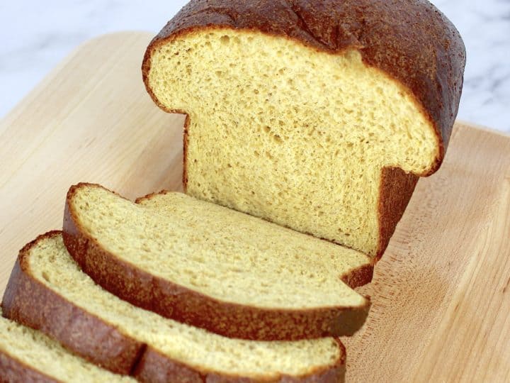 loaf of keto bread cut open and sliced