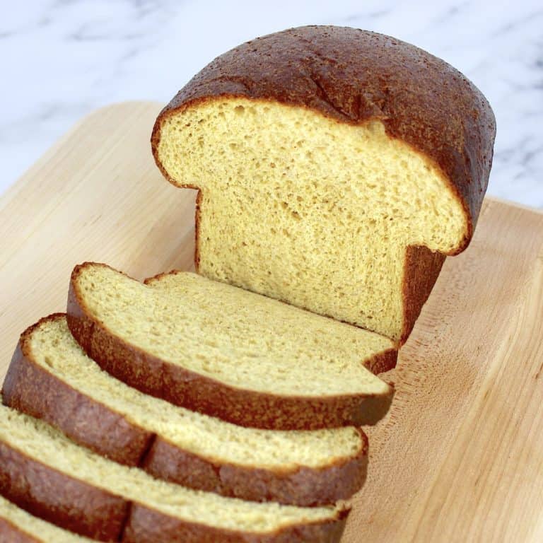 loaf of keto bread cut open and sliced