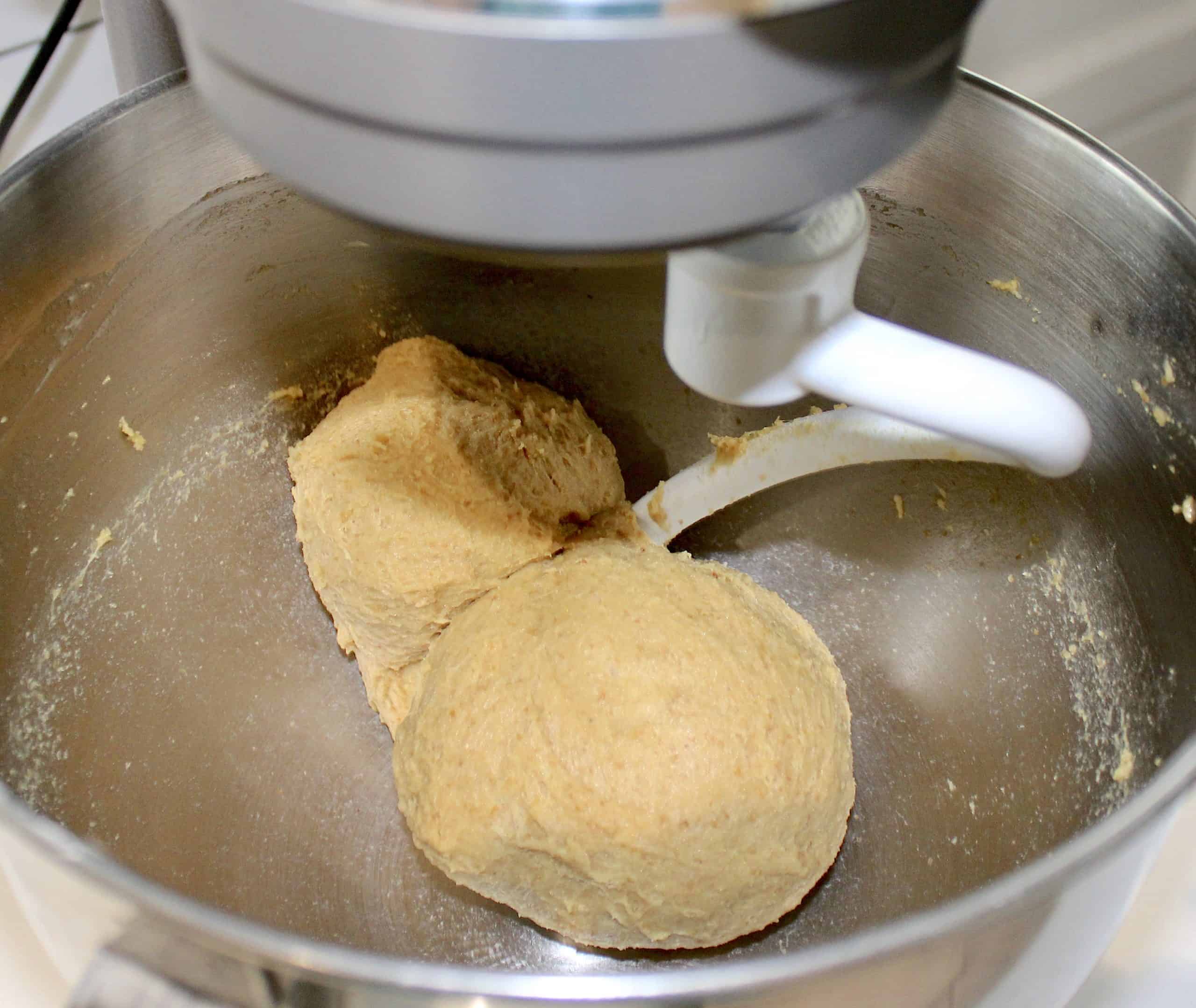 keto bun dough in mixer with dough hook