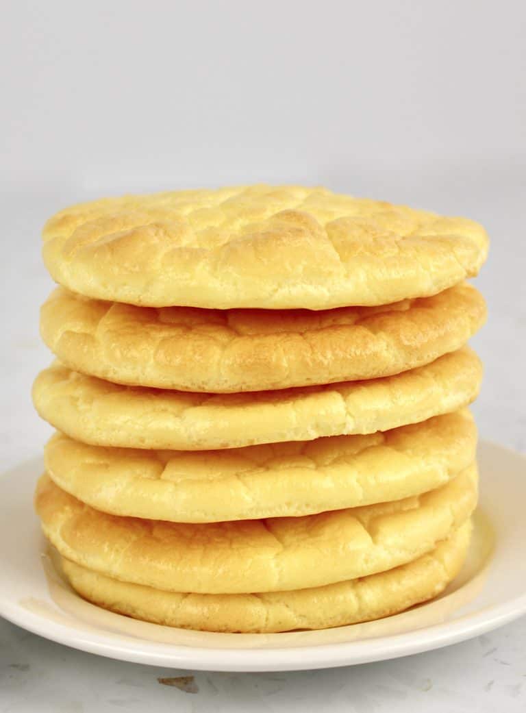 6 pieces cloud bread stacked up on white plate