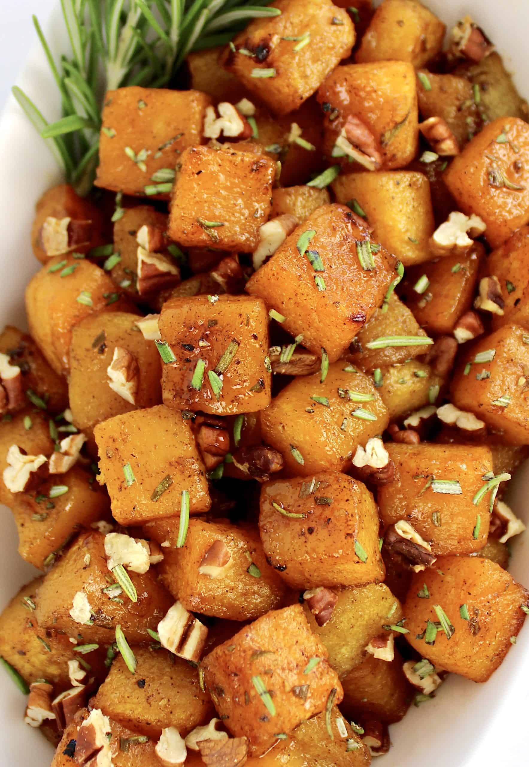 closeup of Maple Roasted Butternut Squash with chopped rosemary